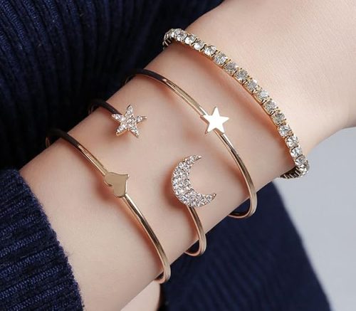 Fashion Frill gold cuff bracelet with multi-layered moon & star design for women.