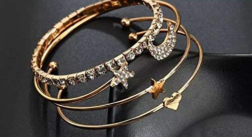 Elegant silver hand bracelets for women with delicate chains on woman's hand